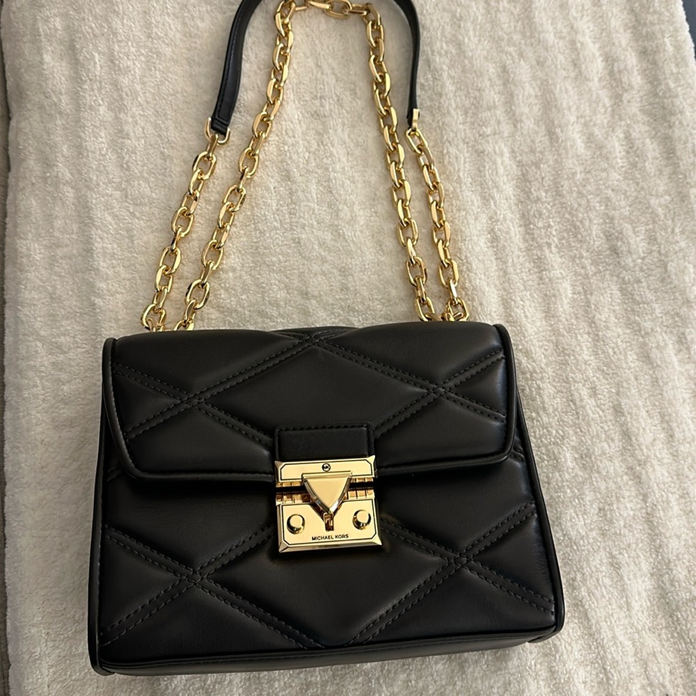 Black quilted evening bag, never used!